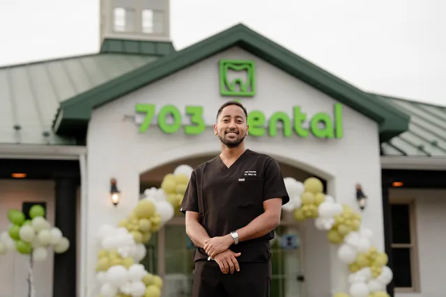 Dr. Bilal Ali, DDS, outside the 703 Dental office in Woodbridge, VA