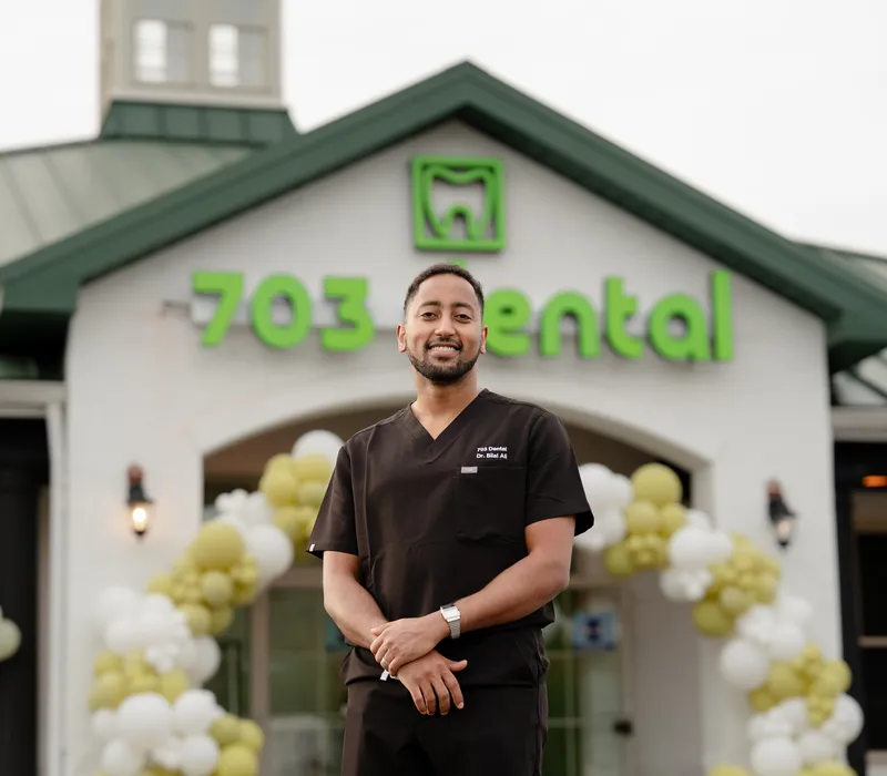 Dr. Bilal Ali, DDS, outside the 703 Dental office in Woodbridge, VA