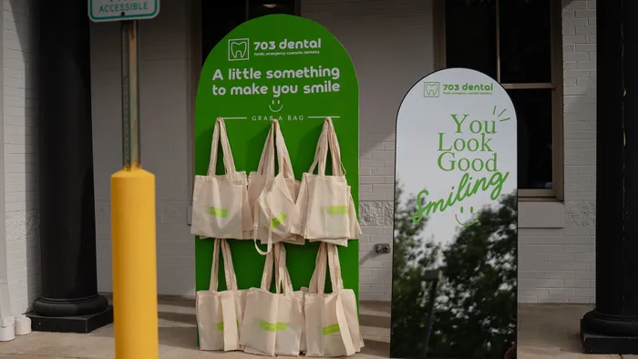 Welcome tote bags for patients outside 703 Dental in Woodbridge, VA